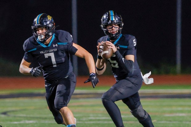 Valley Center quarterback Braylon Mitchell looks to throw. #7 is Josiah Tirado. (Charlie Neuman / For The San Diego Union-Tribune)