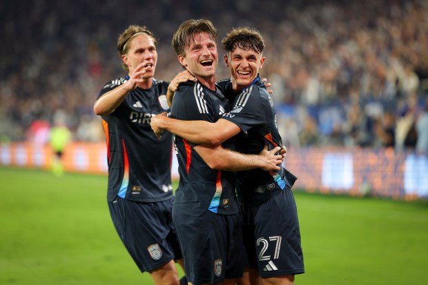 Onni Valakari #8, Anders Dreyer #10 and Luca Bombino #27 of San Diego FC celebrate after Dreyer's goal against the Portland Timbers during match one of the Western Conference Round One of the 2025 MLS Cup Playoffs at Snapdragon Stadium on Sunday, Oct. 26, 2025 in San Diego, California. (Meg McLaughlin / The San Diego Union-Tribune)