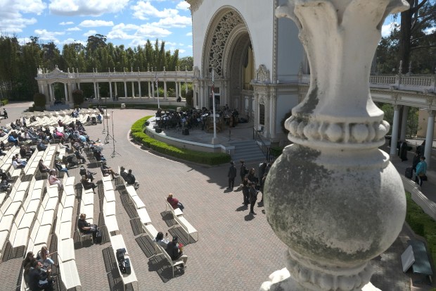 A community band performs a free concert at the Spreckels Organ Pavilion in Balboa Park on April 14, 2024. (John Gastaldo / For The San Diego Union-Tribune)