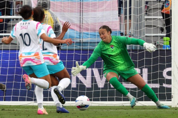 The ball gets past the Wave's goal keeper Kailen Sheridan allowing a score for Bay FC during the first half at Snapdragon Stadium in San Diego on Sunday, May 04, 2025. (Hayne Palmour IV / For The San Diego Union-Tribune)