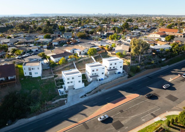 Homes on Reo Drive in Paradise Hills on Tuesday, Dec. 9, 2025. San Diego is launching a new effort to rezone properties in single-family areas for duplexes, cottages, row homes, townhomes and bungalow courts so that young families have more choices than new high-rise buildings or unaffordable single-family homes. (Nelvin C. Cepeda / The San Diego Union-Tribune)