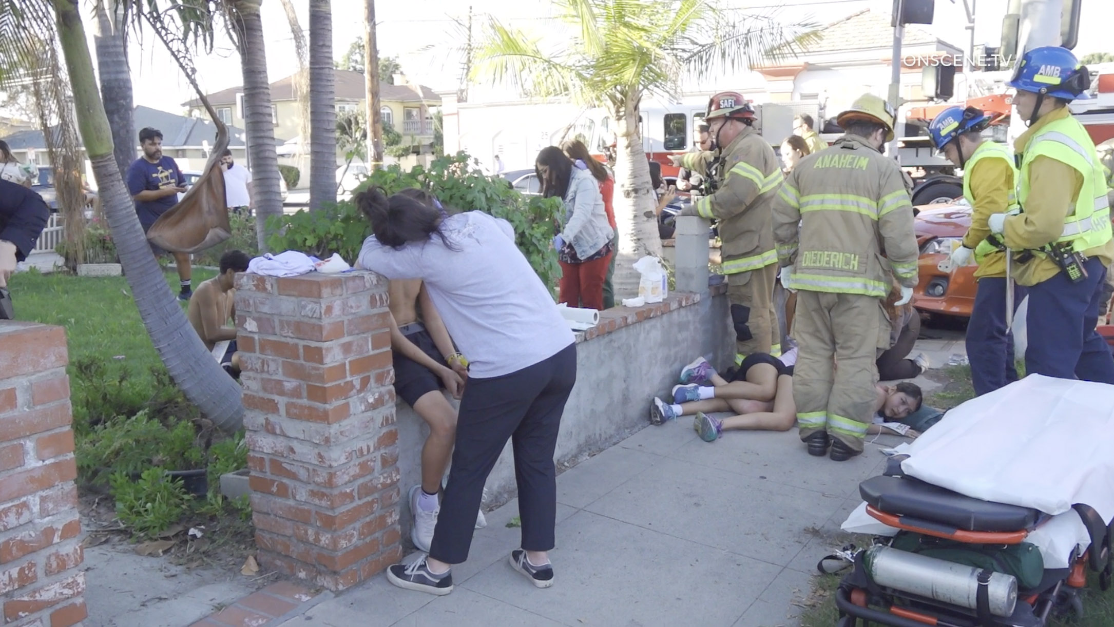 At least eight members of an Anaheim High School running...