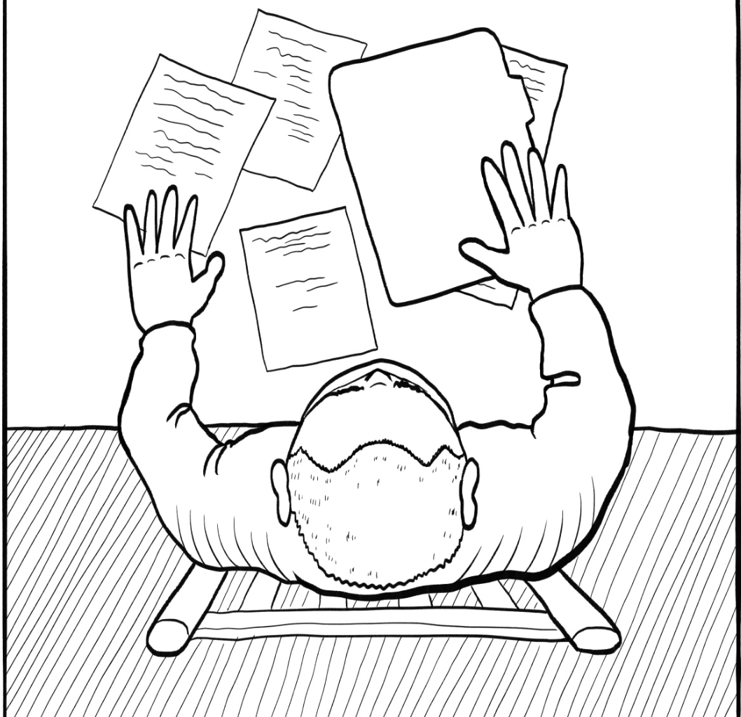 A person viewed from above sits at a desk with scattered papers, holding one sheet above the rest, closely examining it for signs of a scam.