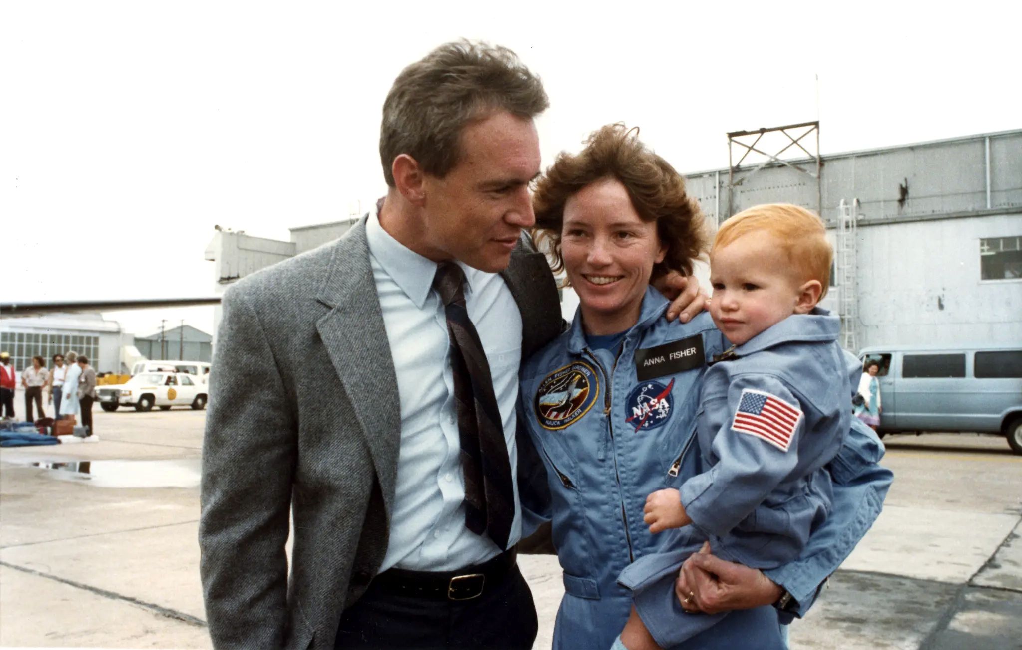 Married astronauts William and Anna Fisher with their daughter, Kristin,...
