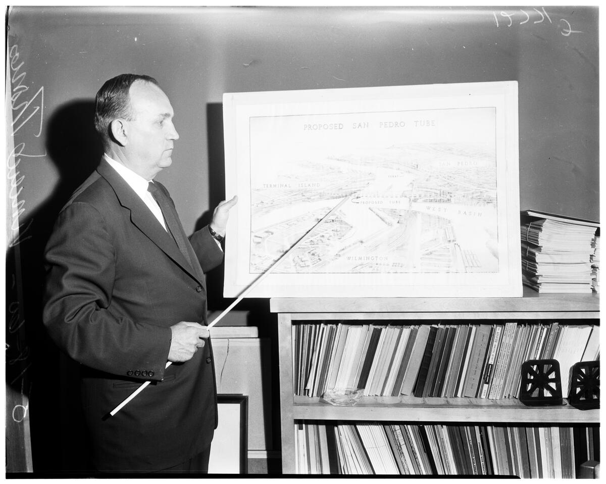 Assemblyman Vincent Thomas points out a drawing of proposed San...