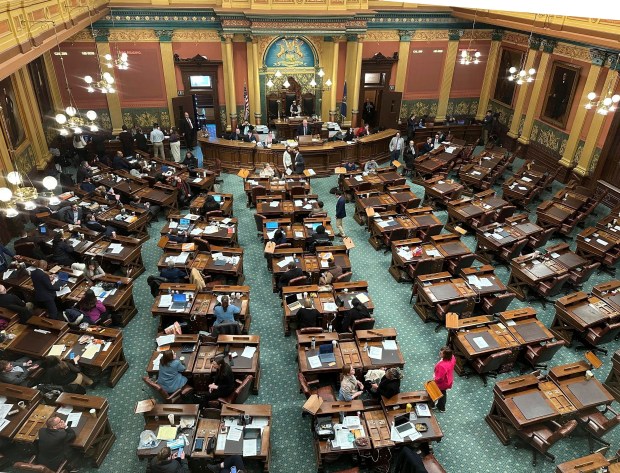 Michigan House of Representatives Republicans boycotted the legislative session on Dec. 13, 2024, saying they would not vote on legislation unless it addressed new minimum wage requirements. With a Democratic representative similarly absent this week, the moves ultimately resulted in the Michigan House Democrats ending their business for the year on Dec. 19, 2024, right before Republicans take control of the chamber. (AP Photo/Isabella Volmert)