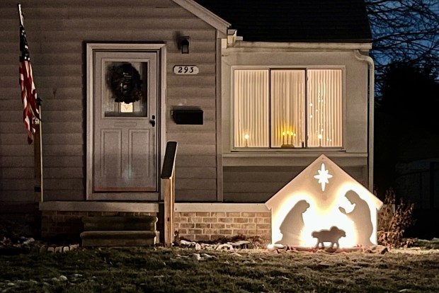 A simple Nativity scene lights up this Clawson home on Charlevoix Street. (Peg McNichol/MediaNews Group)