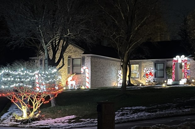 Light glow around a Rochester Hills home on Shagbark Drive near Walton Boulevard on Dec. 23, 2025. (Peg McNichol/MediaNews Group)