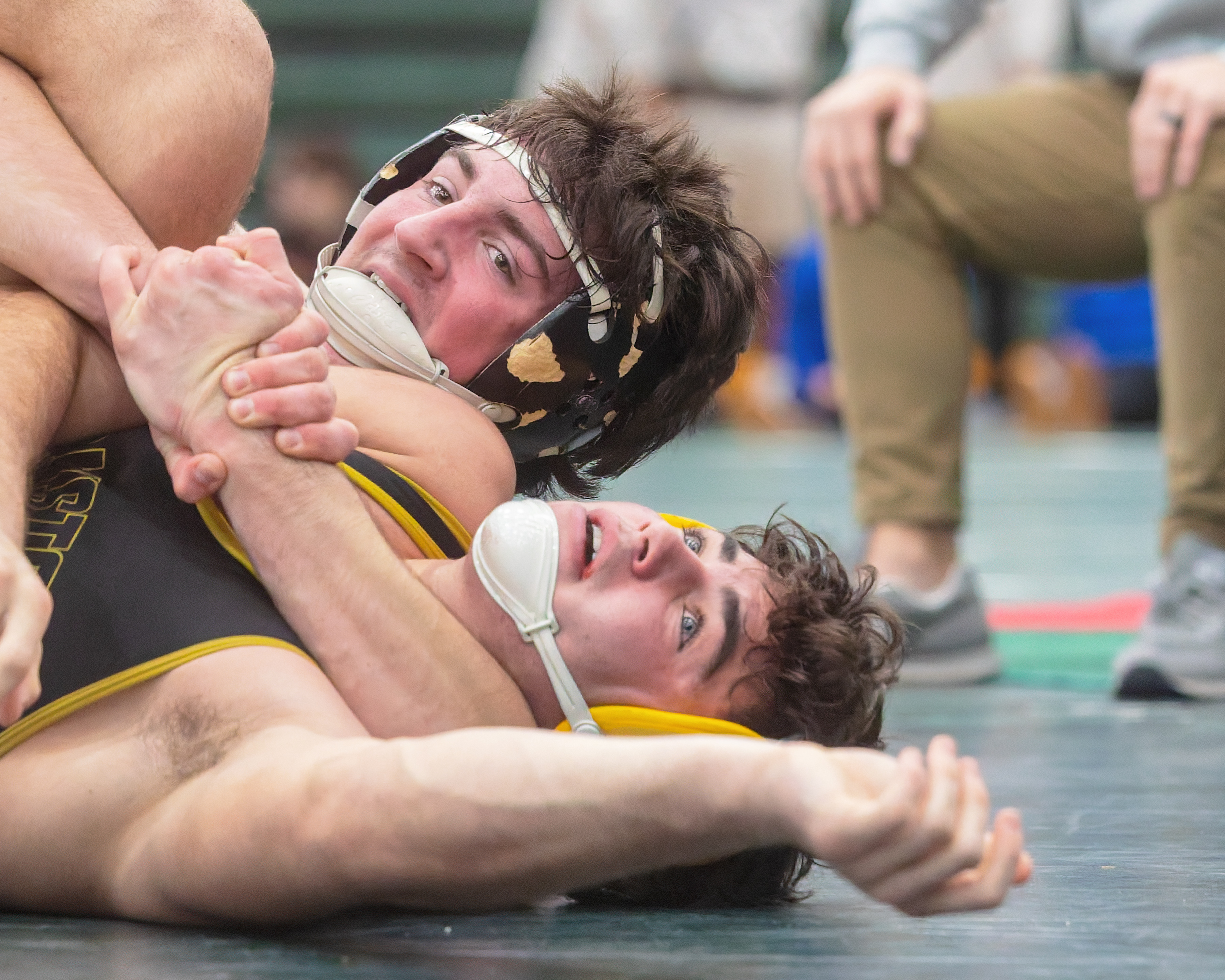 Clarkston's Trey Setter (upper) defeated Walled Lake Northern's James Moore...