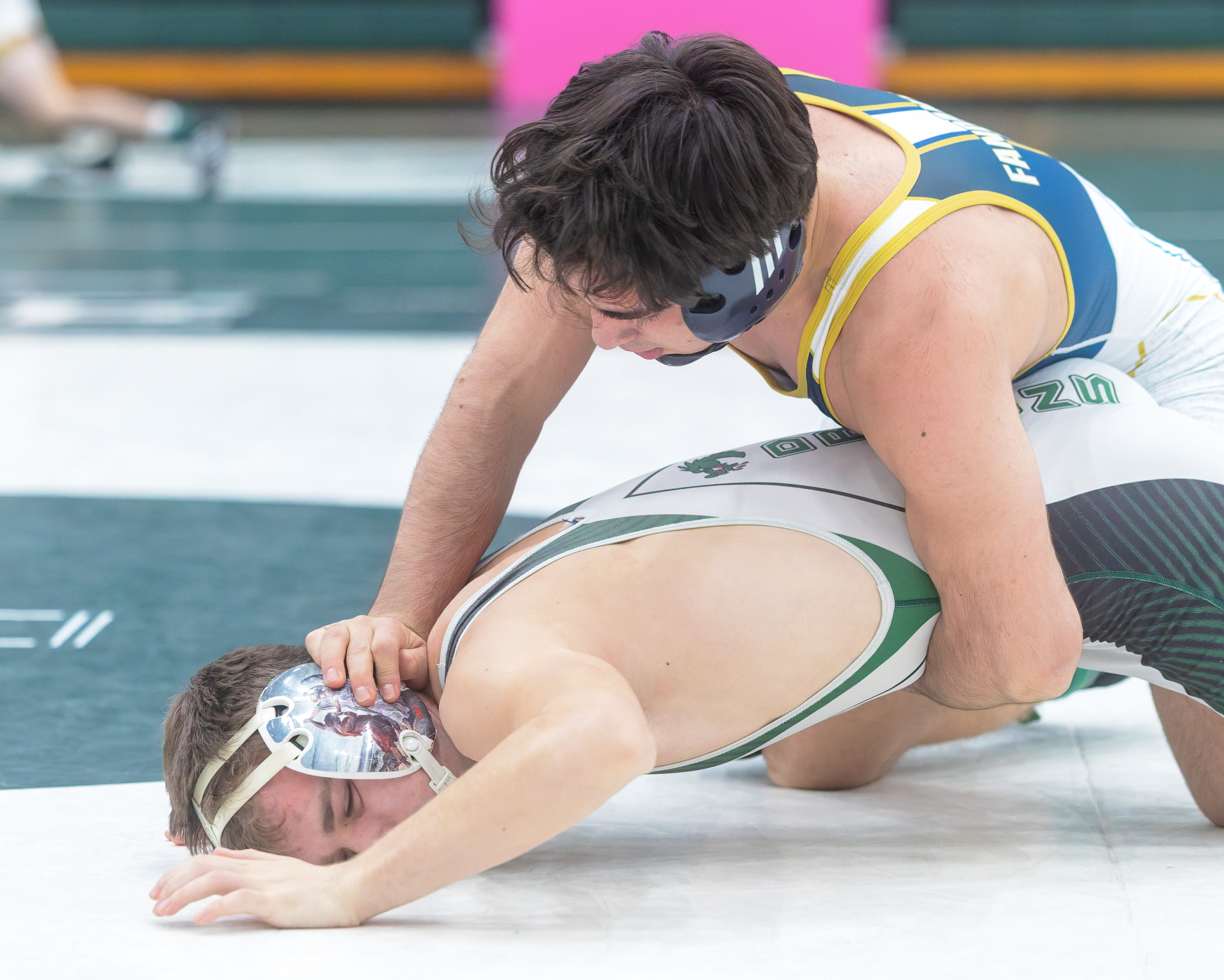 Stoney Creek's Isaac Fandakly (upper) defeats Lake Orion's Donovin Findlay...