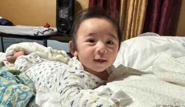 Baby defies all odds after growing outside his mom's womb