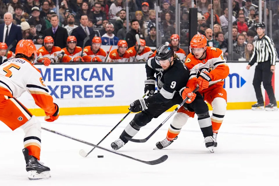 Los Angeles Kings RW Adrian Kempe (9) fights for the puck during an NHL game against the Anaheim Ducks, Saturday December 27th, 2025 in Los Angeles, California.