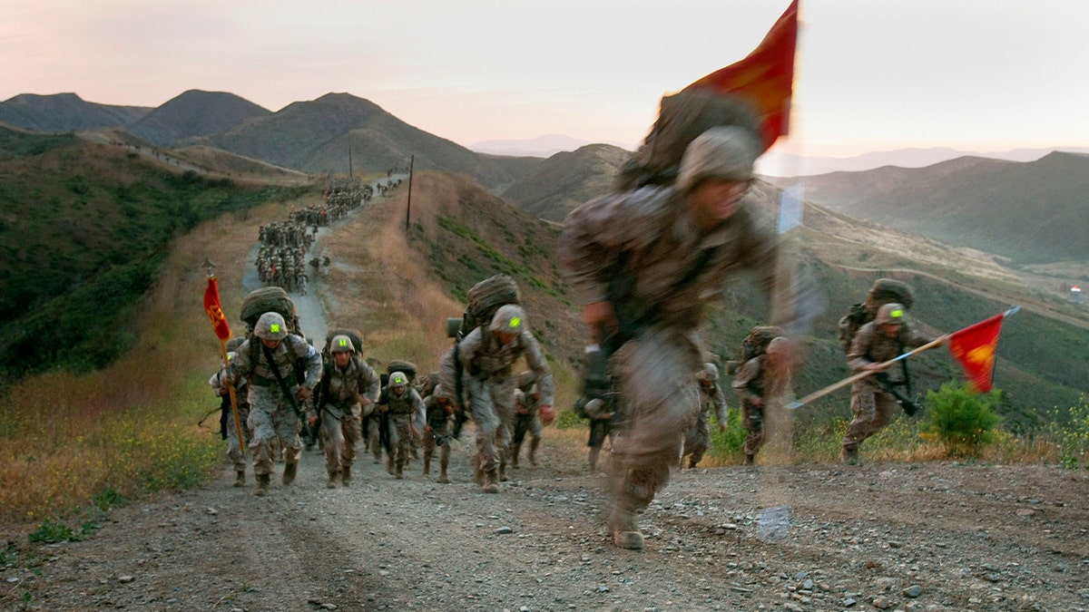 marines training across hills