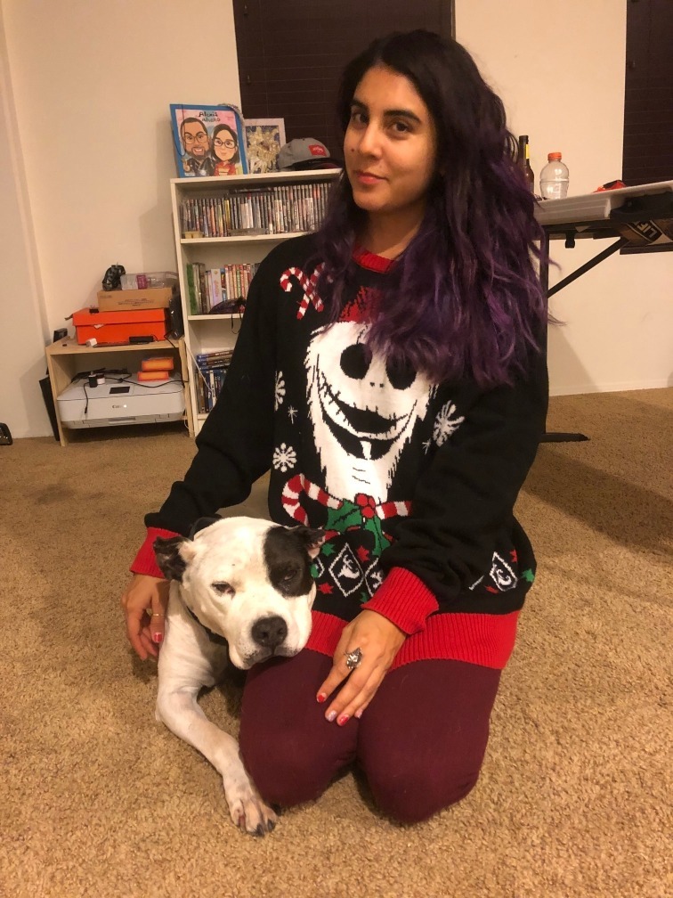 Victim Jessica Alejandra Sanchez Landaverde in an undated GoFundMe photo, with a dog next to her.