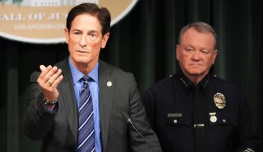 Los Angeles District Attorney Nathan Hochman, left, and LAPD Chief Jim McDonnell announce developments about the murder case of Rob Reiner and his wife Michele on Tuesday, Dec. 16, 2025, in Los Angeles. (AP Photo/Damian Dovarganes)