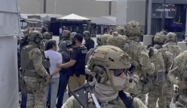 California law banning ICE agents from wearing masks under fire from Trump administration, state agencies