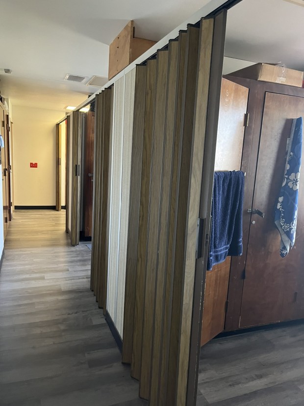 The doors of the sleeping quarters at Fire Station 16 in La Jolla are one of several things planned to be replaced should enough funds be raised. (Parker Davenport)