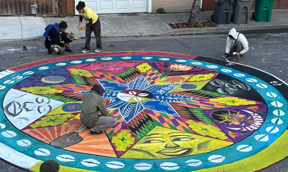 Painters put on the finishing touches of the Oakland Mandala on Nov. 28. Photo courtesy Mandisa Snodey.