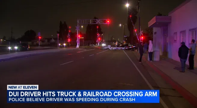 VIDEO: Alleged Drunk Driver Crashes into Trunk and Railroad Arm in Central Fresno