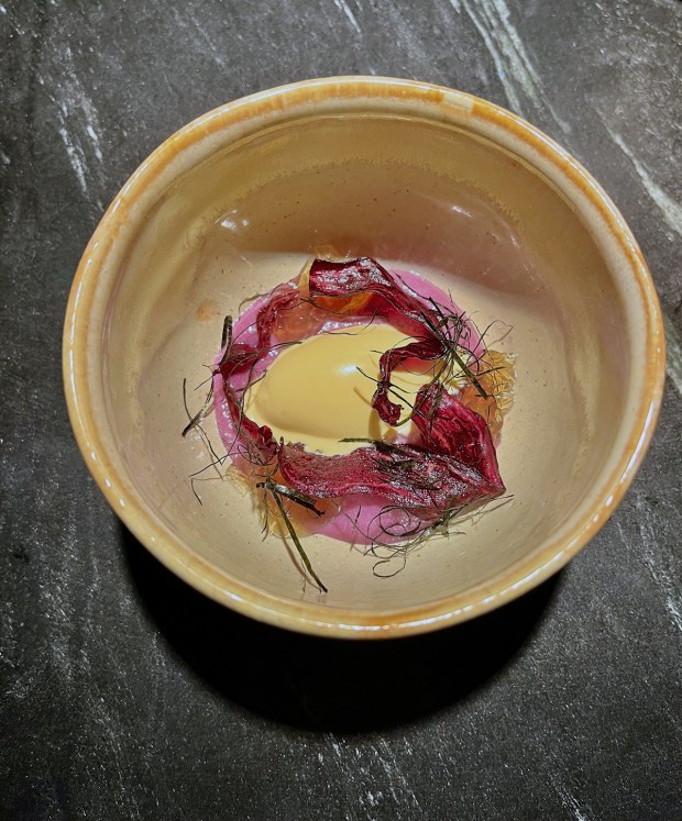 Uni ice cream with Japanese sweet potato ribbons, mushroom gelee, rishin kombu threads and white soy. (Pam Kragen - The San Diego Union-Tribune)