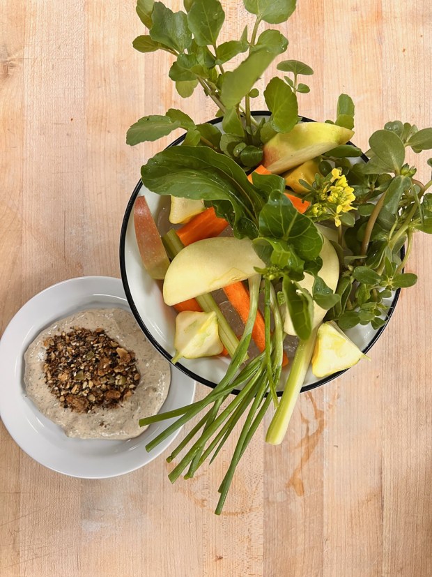 The opening crudités course in the mezze dinner service at The Louge at LuckyBolt in Sorrento Valley. It features fresh-picked vegetables from Chino Farms and "enranched" tahini sauce with dukkah seasoning. (LuckyBolt)