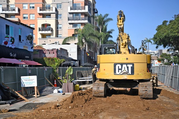 Construction along Fifth Avenue, seen Dec. 16, 2025, is hurting local businesses, their owners say. (Denis Poroy for The San Diego Union-Tribune)