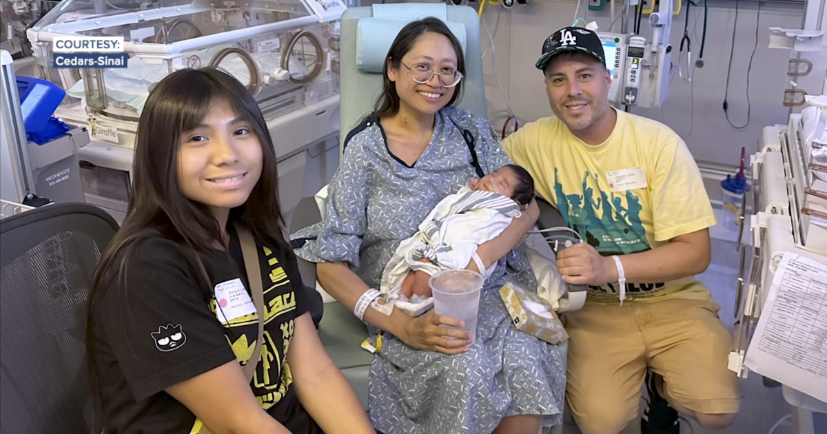 Woman gives birth days after learning she was pregnant