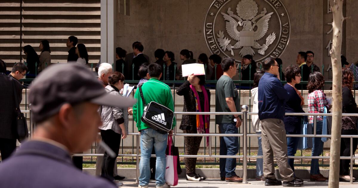 Apple, Google and others tell some foreign employees to avoid traveling out of the country