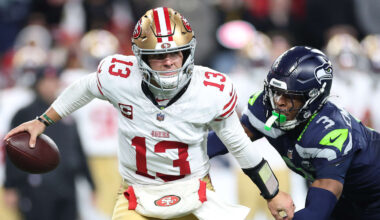 San Francisco 49ers quarterback Brock Purdy (13) is chased by Seattle Seahawks safety Nick Emmanwori (3)