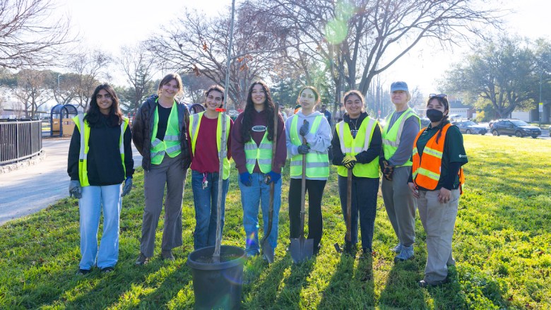 A group of young volunteers gather to plant trees to honor MLK Day in 2026