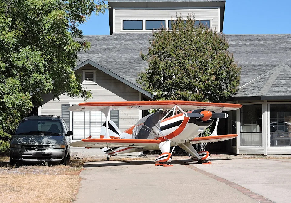 Cameron Airpark plane in driveway.