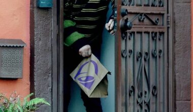 A bald Mickey Rourke looked unrecognizable as he emerged from the LA home he is potentially facing eviction from after allegedly failing to pay nearly $60,000 in rent