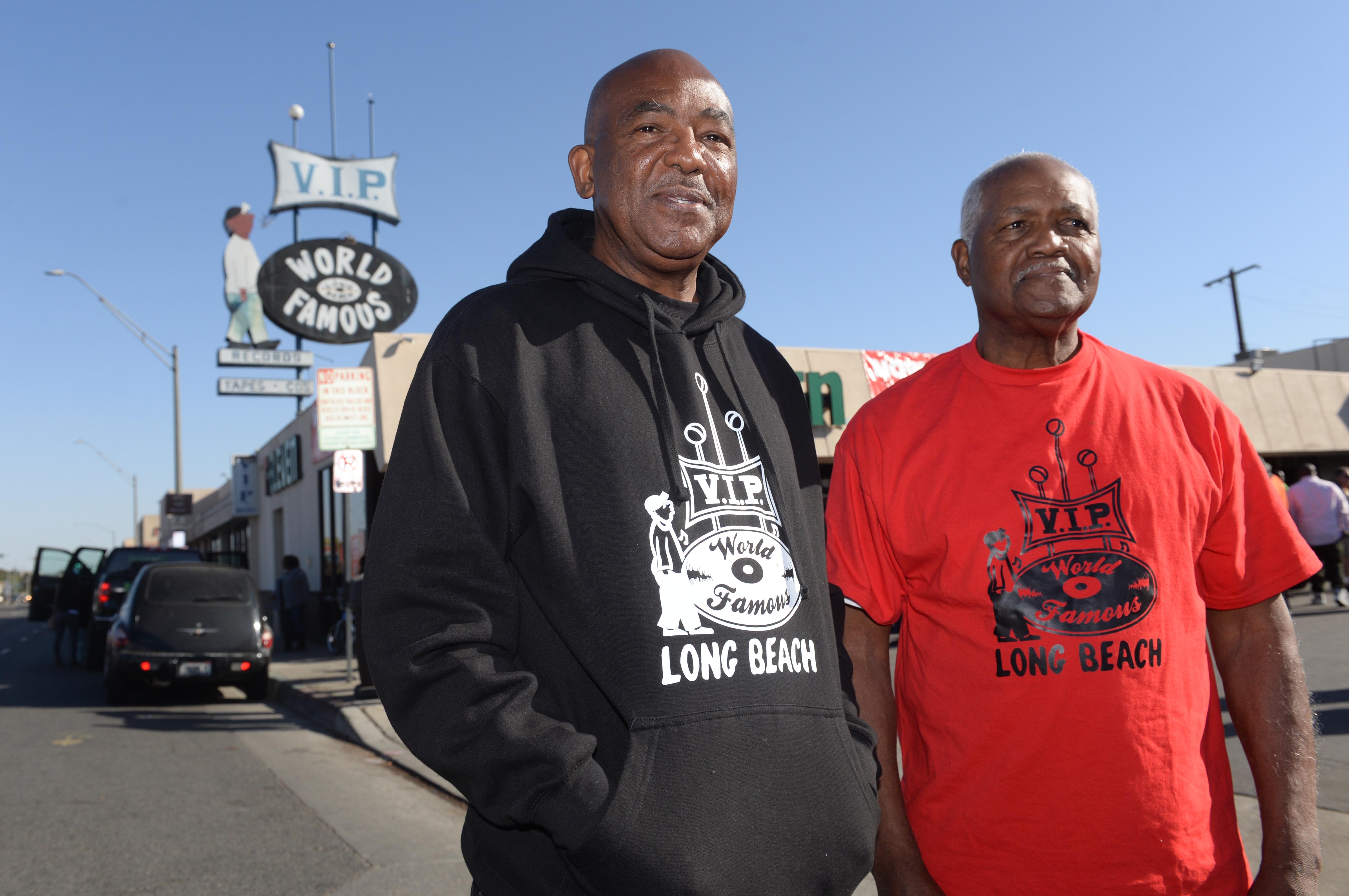 Mayor Robert Garcia is presented a proclamation to brothers Kelvin...