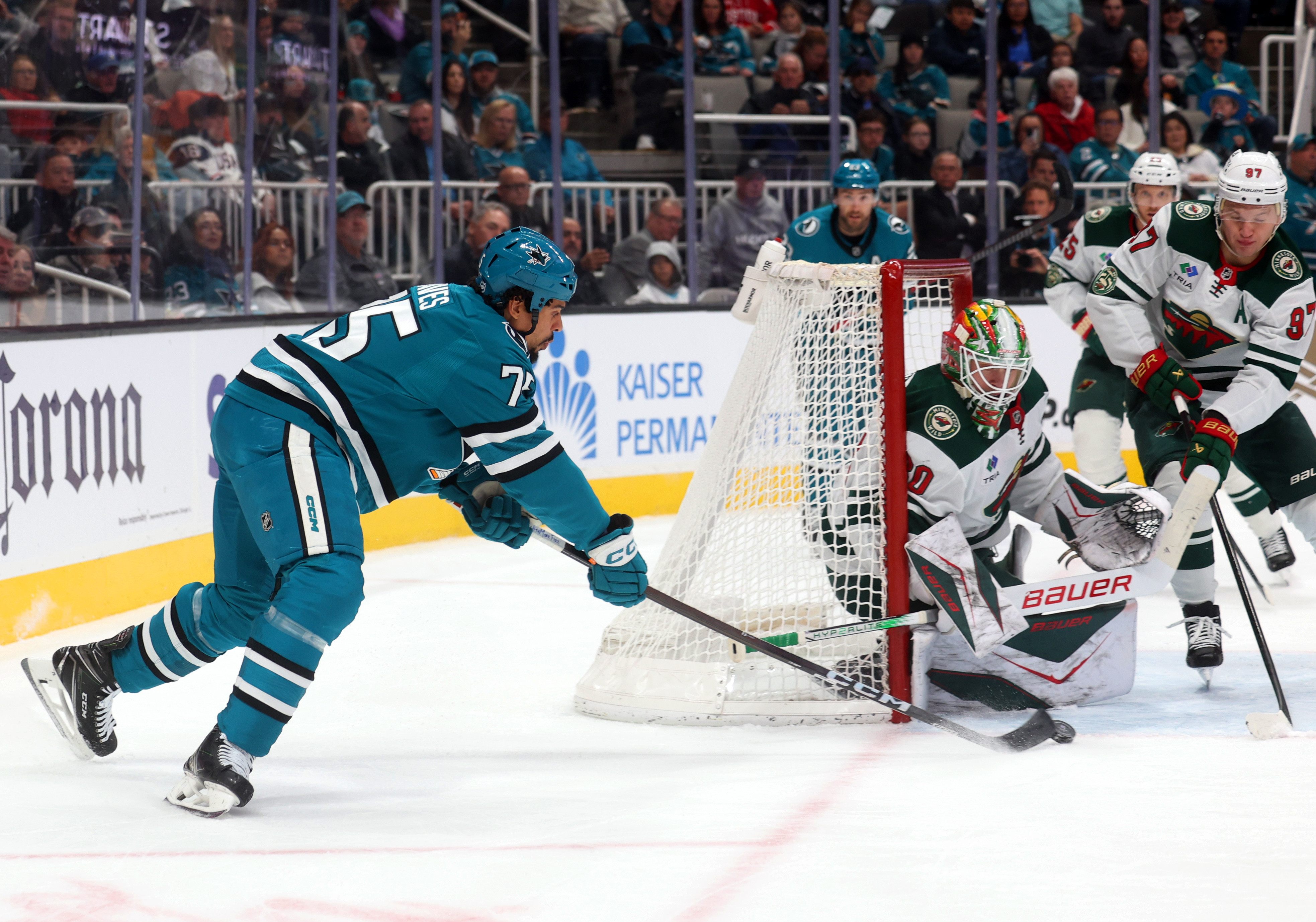 San Jose Sharks forward Ryan Reeves (75) tries to get...