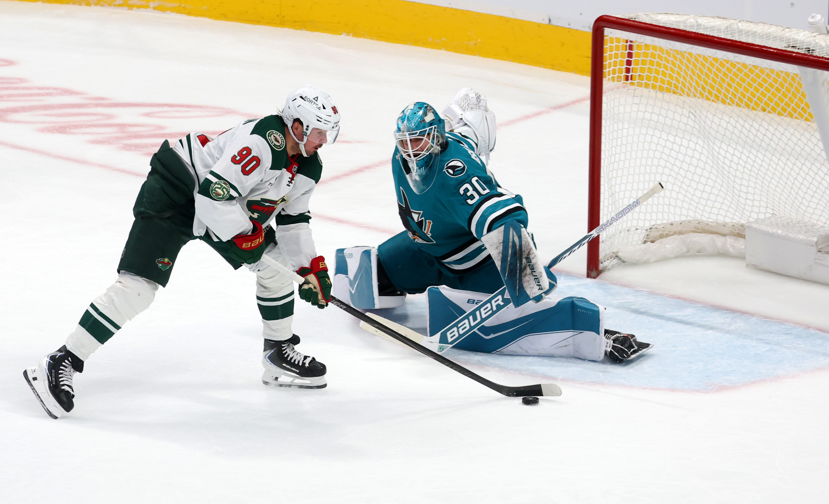San Jose Sharks goaltender Yaroslav Askarov (30) makes a save...
