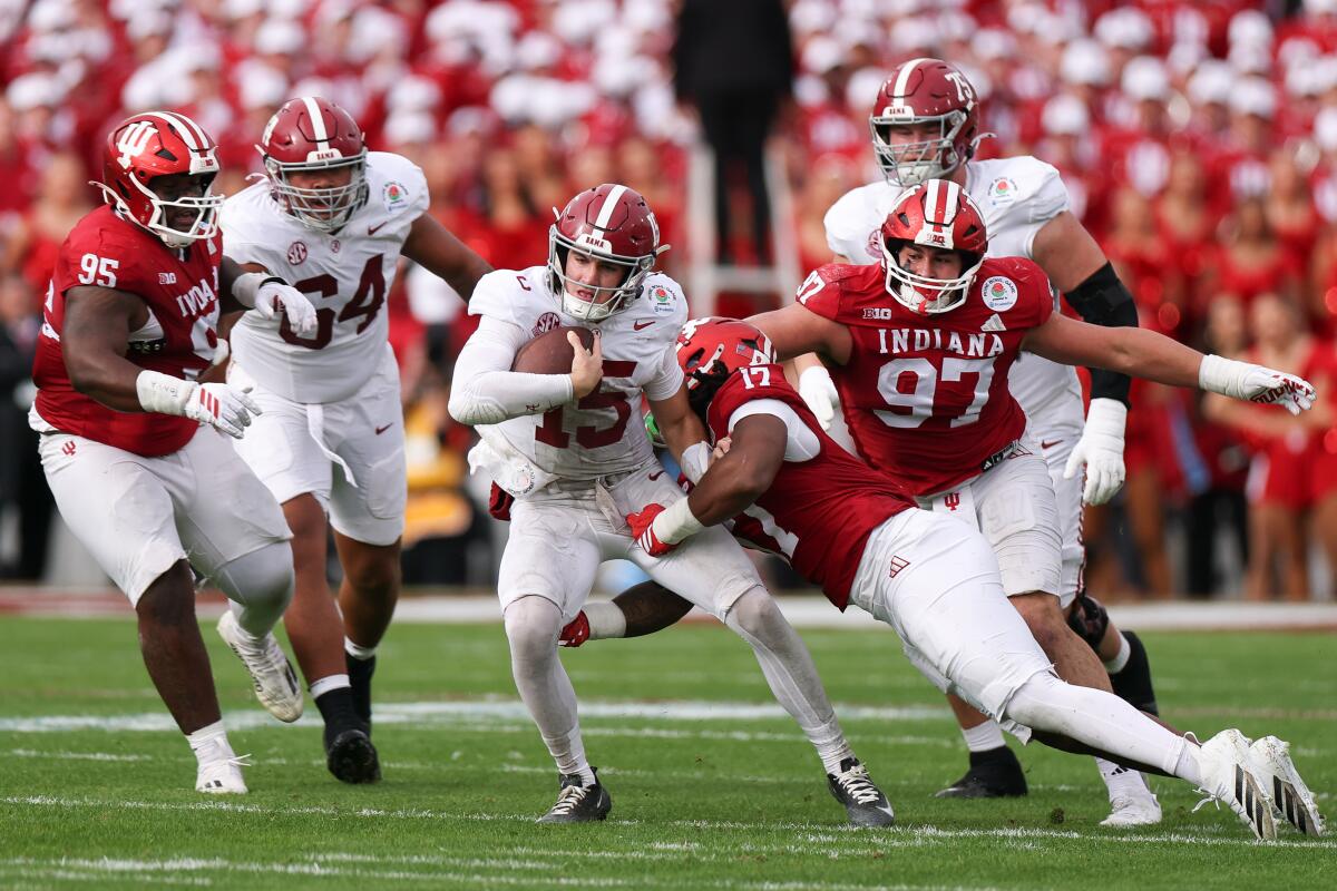 Indiana defensive lineman Daniel Ndukwe tackles Alabama quarterback Ty Simpson in the second quarter.