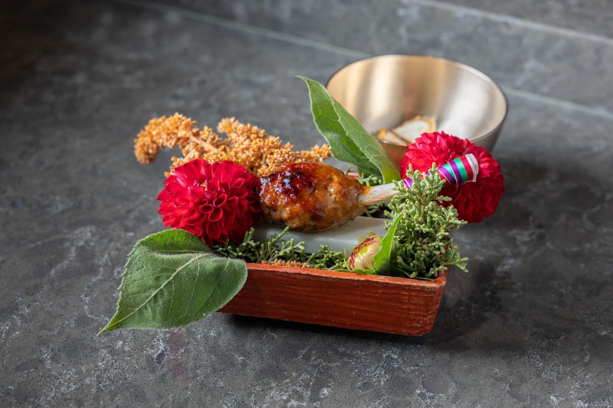 An elaborate $300-per-person meal might include Kim's dish of wild boar.