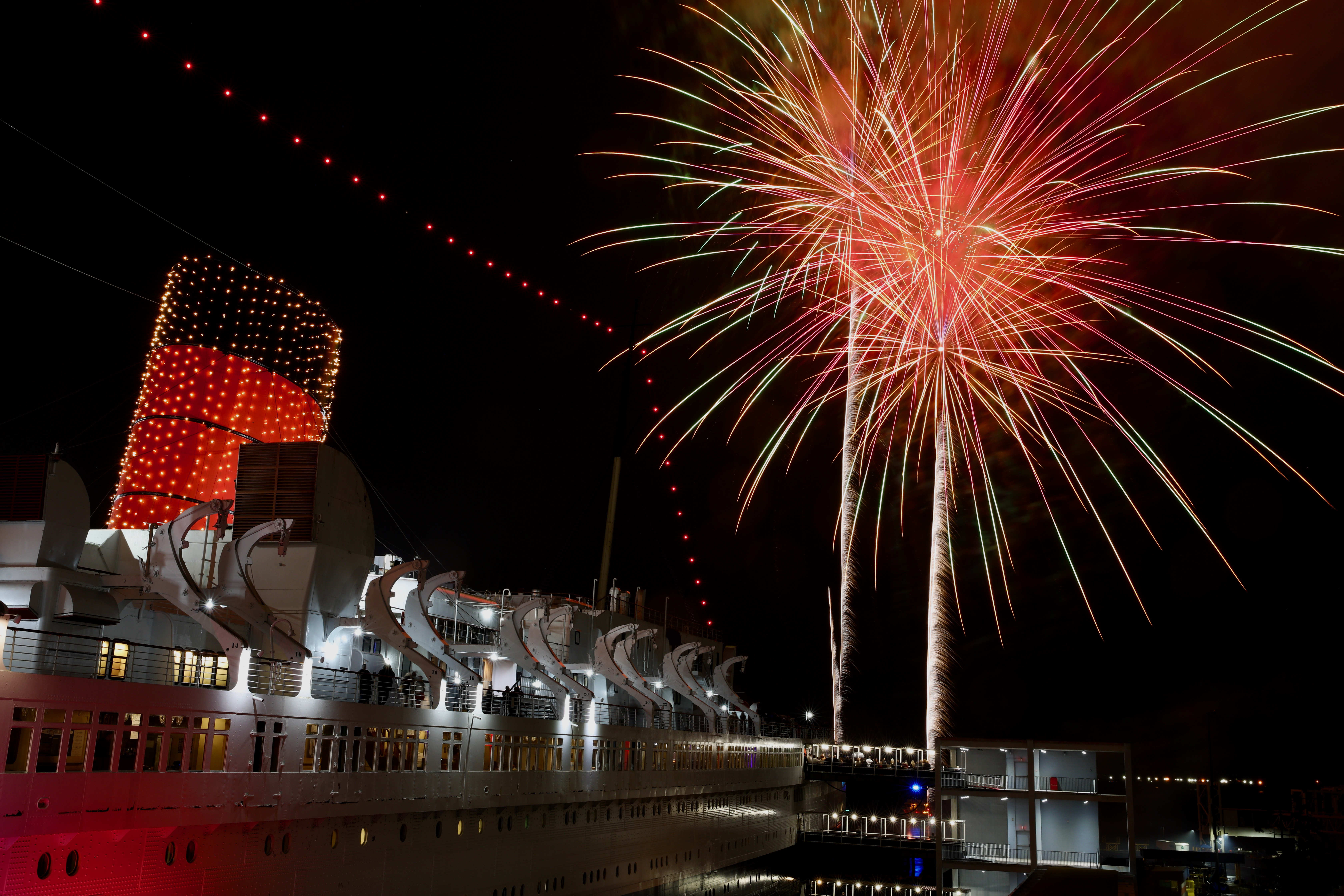 A midnight fireworks show at the Queen Mary in Long...