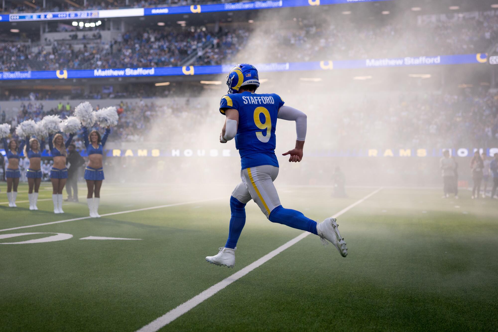 Rams quarterback Matthew Stafford takes the field before a win over the Detroit Lions on Dec. 14.