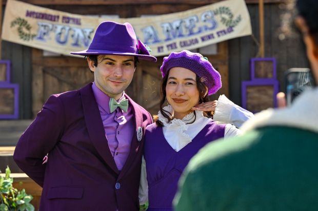 Logan Allison and Felicia Wade in their boysenberry attire at the the Calico Mine Stage after a National Boysenberry Day photo at Knott's Berry Farm in Buena Park, CA, on Monday, April 3, 2023. (Photo by Jeff Gritchen, Orange County Register/SCNG)