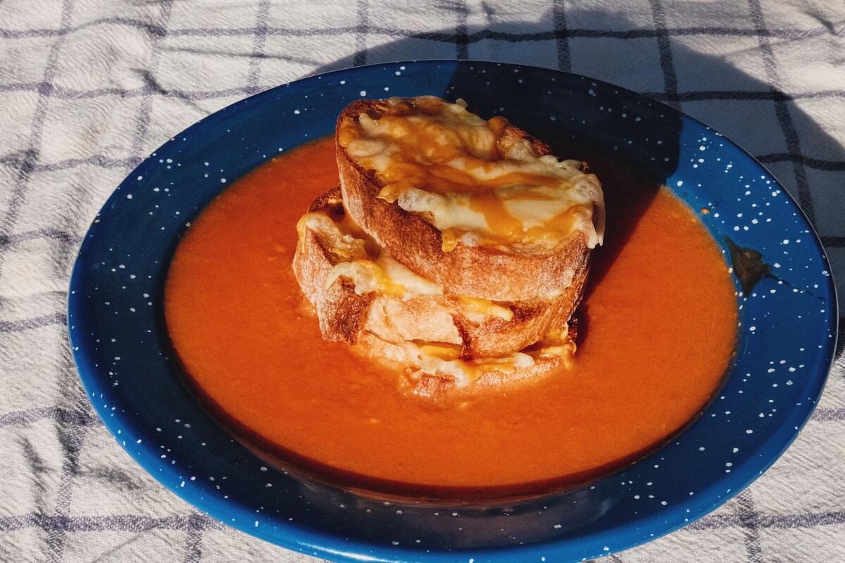 Broiled and Burnt Roasted Tomato Soup With Grilled Cheese Crostini