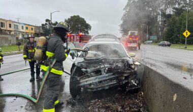 Firefighters rescue occupants from burning car in San Francisco