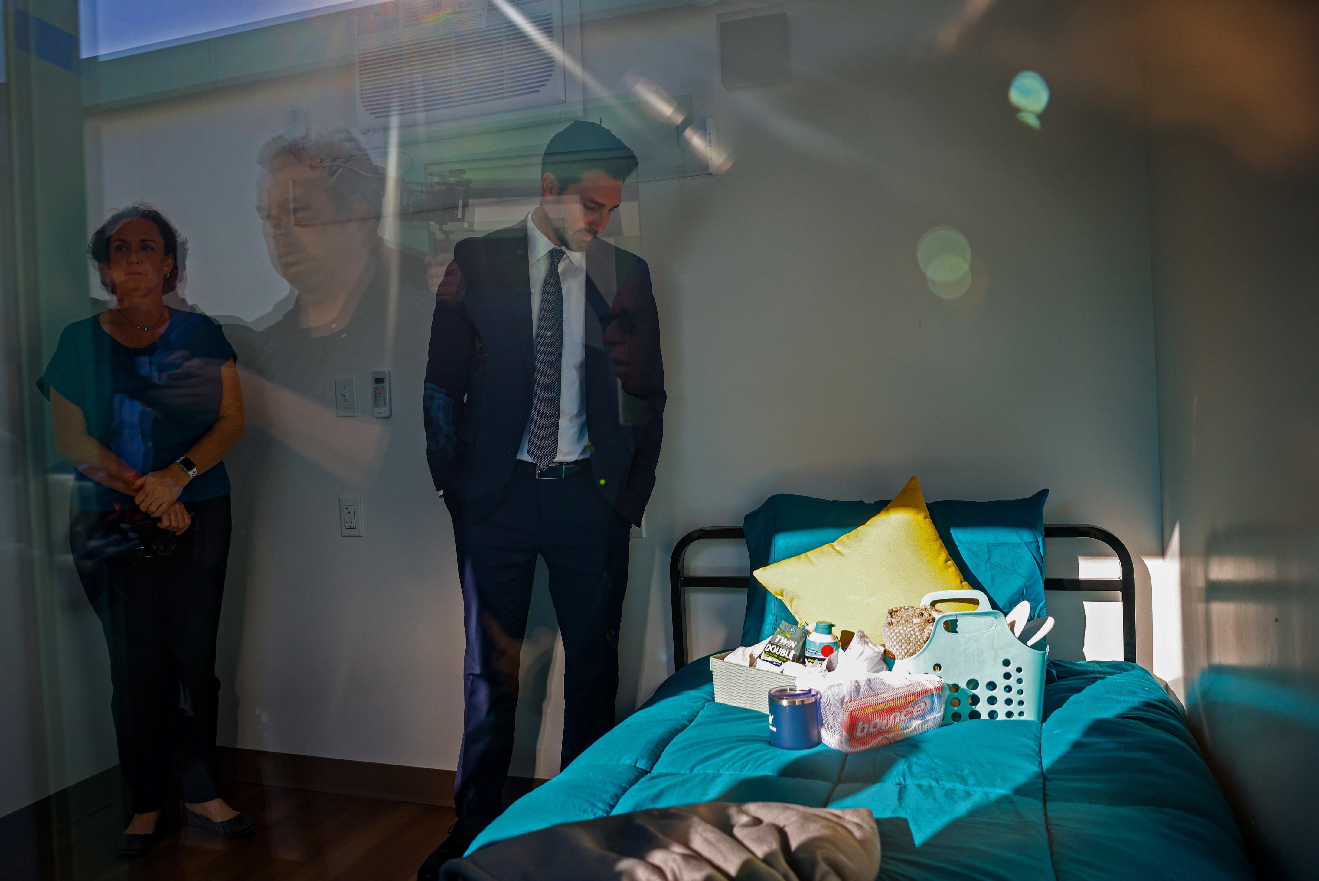 Ian Calderon, who served in the California State Assembly, right,...