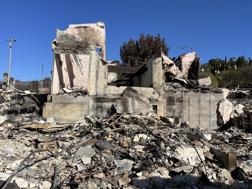 Charred rubble is all that remains of a home.