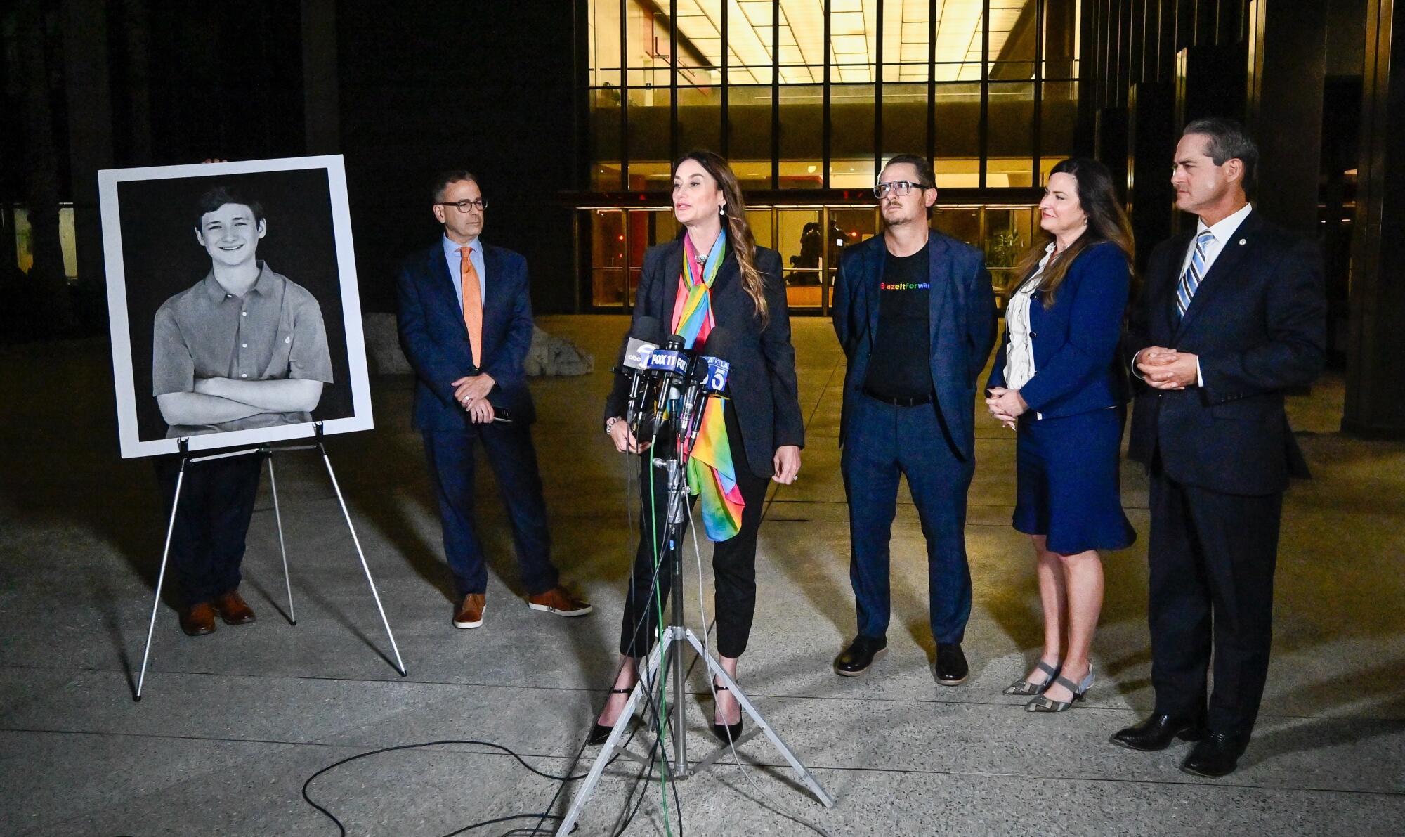 Gideon Bernstein and Jeanne Pepper Bernstein, center, parents of Blaze Bernstein
