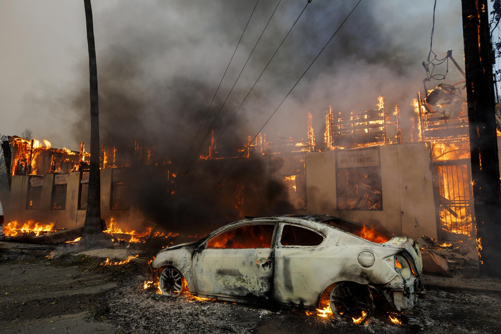 A business and vehicle burn in the Eaton fire.