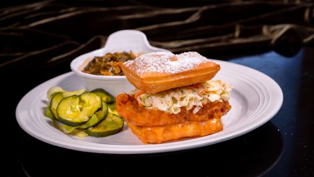 Buffalo Chicken Beignet Sandwich available at Tiana's Palace in Disneyland during the 70th anniversary celebration. (Courtesy of Disneyland)