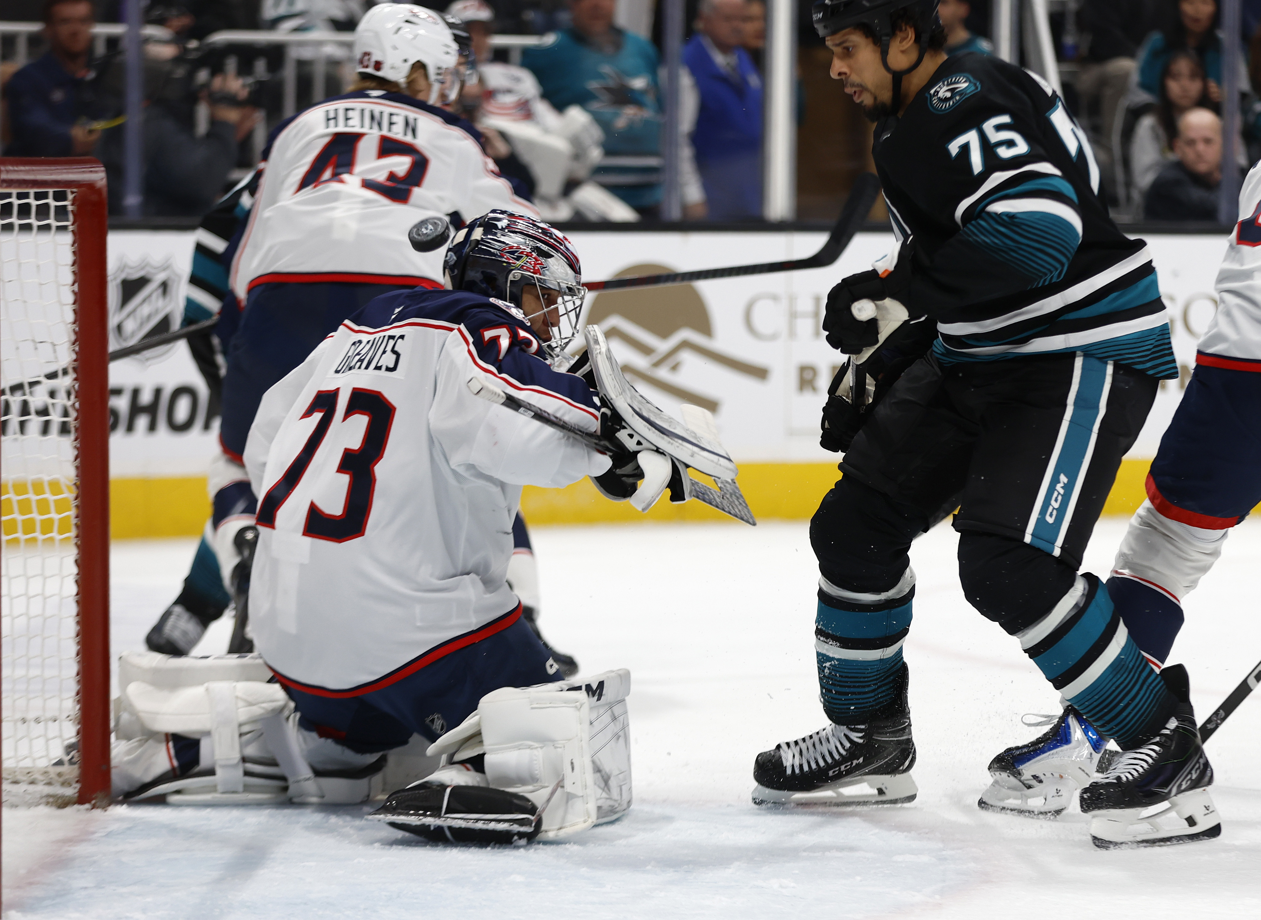 San Jose Sharks’ Ryan Reaves (75) and Columbus Blue Jackets...