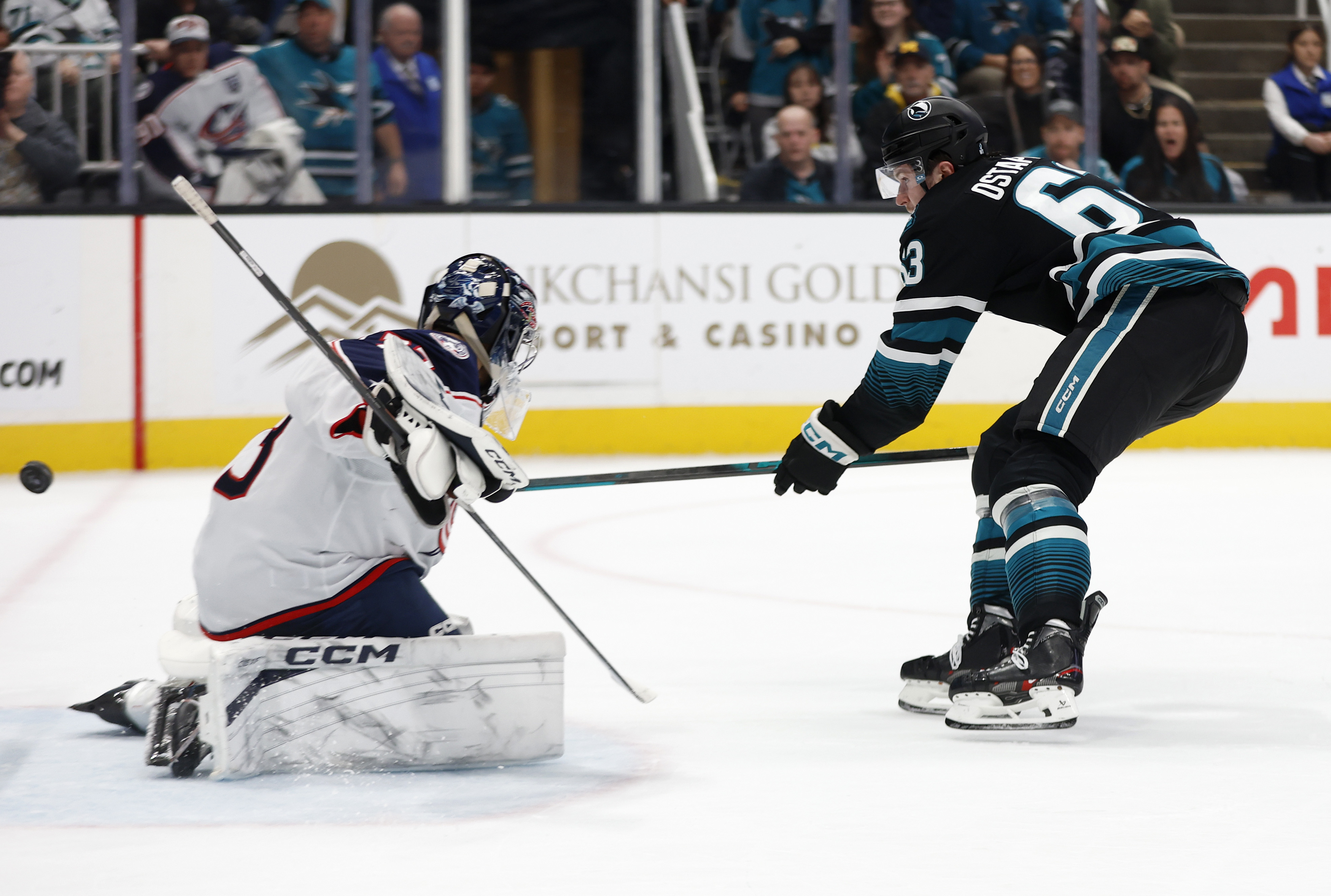 San Jose Sharks’ Zack Ostapchuk (63) scores a goal against...