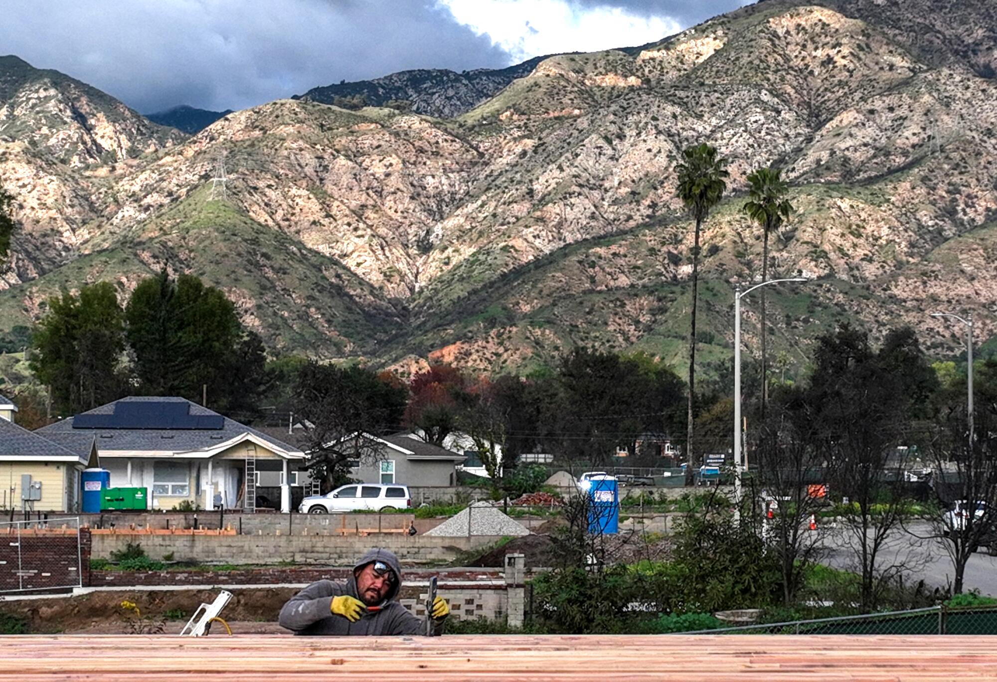 Avaristo Serrano helps build a home on Highview Street.